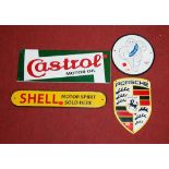 A collection of reproduction metal advertising signs, to include Porsche, Michelin, Shell and