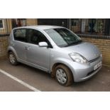 A Daihatsu Sirion 1.3SE, registration number EJ56 VXU, five-door silver hatchback, approx 6,000