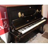 An early 20th century German ebonised upright piano by Stephan Hain Crefeld, Model 28, iron framed