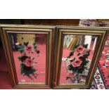 A pair of early 20th century gilt composition framed and bevelled wall mirrors, each polychrome