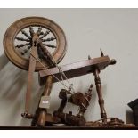 A yew wood spinning wheel (with damages)