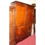 A 19th century mahogany double door wardrobe, having two short over single long lower drawer, w.