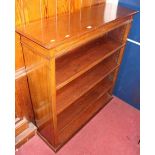 An Edwardian mahogany and satinwood crossbanded low freestanding open bookshelf, with three
