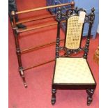 A Victorian ebonised bedroom chair, together with a Victorian mahogany towel rail (2)
