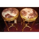 A pair of contemporary French style gilt painted and rouge marble inset circular occasional