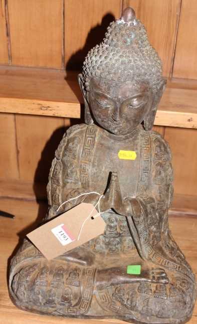 A cast metal model of a seated Buddha, h.40cm