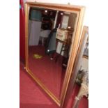 A contemporary gilt framed and bevelled large rectangular wall mirror, 154 x 120cm