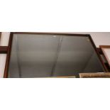 A reproduction faux mahogany framed and bevelled rectangular wall mirror, 100 x 130cm