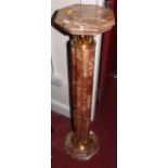 A pair of contemporary rouge marble and gilt metal mounted pedestal columns, the octagonal tops