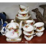 A Royal Albert six place setting tea service, in the Old Country Roses pattern, together with