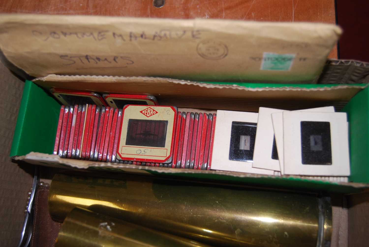 A box of miscellaneous items, to include a pair of brass shell cases, pocket cigarette lighters, - Image 10 of 11