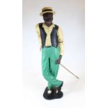 A modern painted resin figure of a male pool player in standing pose, h.60cm; together with one