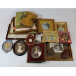 A box of miscellaneous items, to include reproduction painted wooden panels, modern wax portrait