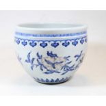 A Chinese stoneware blue and white jardinière, having a Greek Key border with flowering fruit