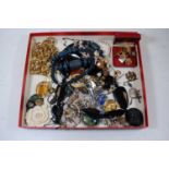 A collection of costume jewellery, to include beaded necklaces, large gold plated curblink necklace,