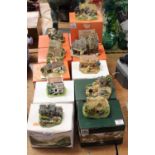 A collection of 11 boxed Lilliput Lane cottage ornaments, to include Badger Rise, The Magpie Cafe,