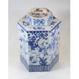 A reproduction Chinese style jar and cover, of hexagonal form, decorated with various figures h.