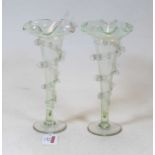 A pair of Victorian clear glass trumpet shaped spill vases, with applied spiralling decoration, h.