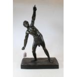 After Demetre Chiparus (1886-1947) - A bronze figure of a semi-nude man, in standing pose with arm