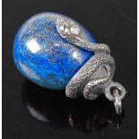 A white metal and blue hardstone snake pendantCondition report: Gross weight 13.4g.Gross length