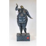 A contemporary bronzed model of a lady, in standing pose on a retcangular plinth, h.47cm