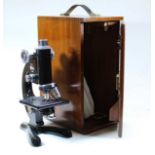 A Beck of London model 47 monocular microscope, No.29231, in fitted case
