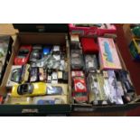Two boxes containing a collection of various diecast model vehicles to include a Sunstar Lotus Elan,