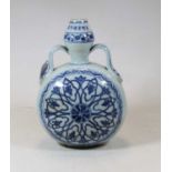 A reproduction Chinese blue and white moon flask, having underglaze blue geometric decoration,