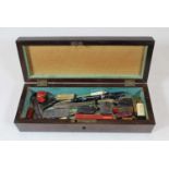 A Victorian rosewood glove box containing various wax seals, pocket knife etc