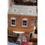 A dolls house 65cm high, and contents including furniture and fittings