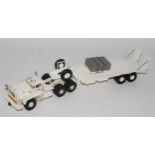A Hart Smith Models Mack Heavy Tow Bigge Truck with wide bed low loader, finished in white with