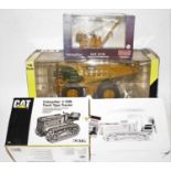 A Norscot and ERTL boxed mixed scale construction vehicle group, three boxed examples to include a