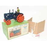 A Britains Model farm No. 127F Fordson Major tractor with spud wheels comprising of dark blue body