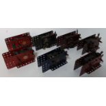 Seven 1930s Meccano electric side plate motors: 3x6v; 1x20v; 2x110v and one unidentified