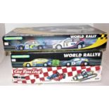 Three various boxed Carerra and Scalextric boxed slot car racing gift sets to include a Carerra