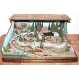 A very well made Marklin Z Gauge housed in a wooden case with skyline back drop, built to a very