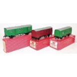 Three Hornby-Dublo long wheelbase items: 4315 horsebox BR maroon and 4316 horsebox BR(S) green, both