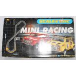 Scalextric Mini Racing set, has been open but seems in good order with 2 Minis inside plus track