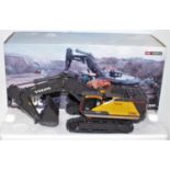 A WSI Models 1/50 scale model No. 61-2001 boxed diecast model of a Volvo EC950E tracked excavator