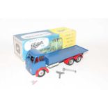 A Shackleton Toys model of a Foden FG flatbed lorry comprising of dark blue cab and back with red