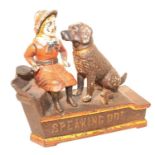 A reproduction cast iron JE Stevensons speaking dog money bank, appears to be fully working order