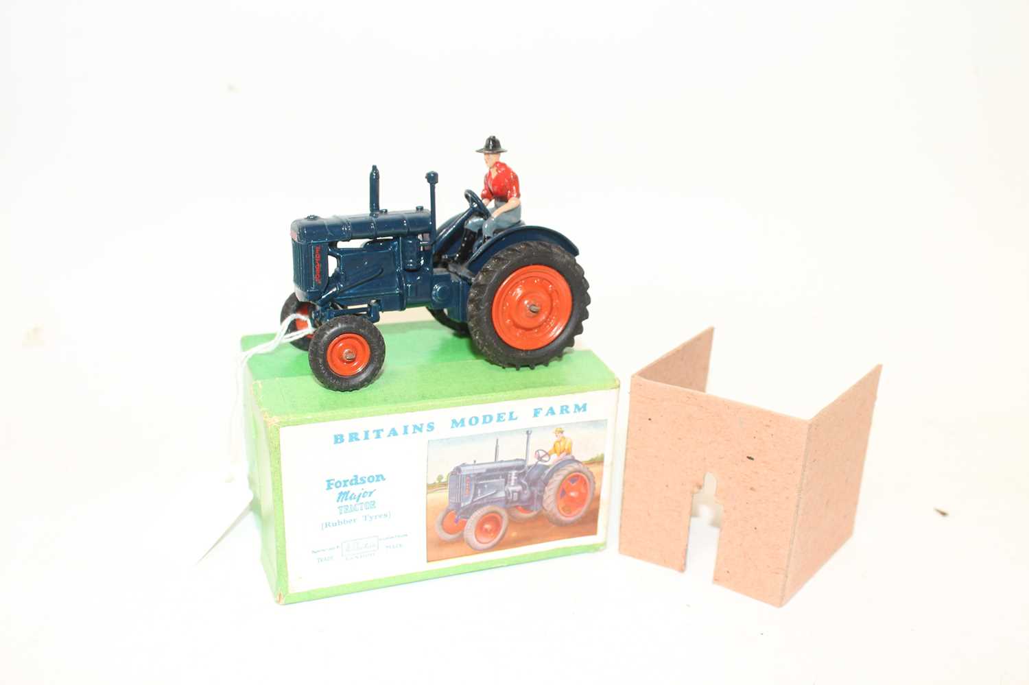 A Britains model farm No. 128F Fordson Major tractor comprising of dark blue body with orange hubs