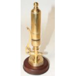 Brass Train Whistle, on wooden plinth, well polished
