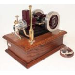 A very well engineered model of a 4 Stroke Single Cylinder Petrol Engine, finished in maroon and