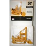 A Speccast 1/16 scale boxed diecast model of a Caterpillar D2 track type traxcavator housed in the