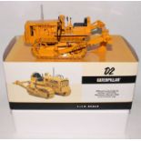 A Speccast 1/16 scale diecast model of a Caterpillar D2 track type tractor (5U series with tool