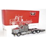 A WSI Models No. 04-1041 Western Star 1/50 scale model of a 4964 SX-1 heavy haulage tractor unit