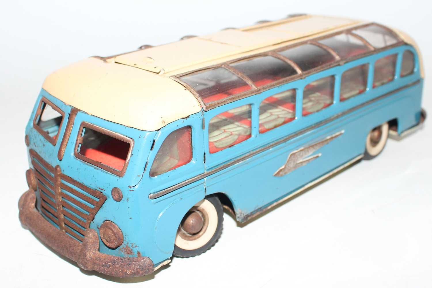 A Gunthermann tinplate clockwork continental holiday touring coach, complete with key in very good