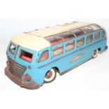 A Gunthermann tinplate clockwork continental holiday touring coach, complete with key in very good