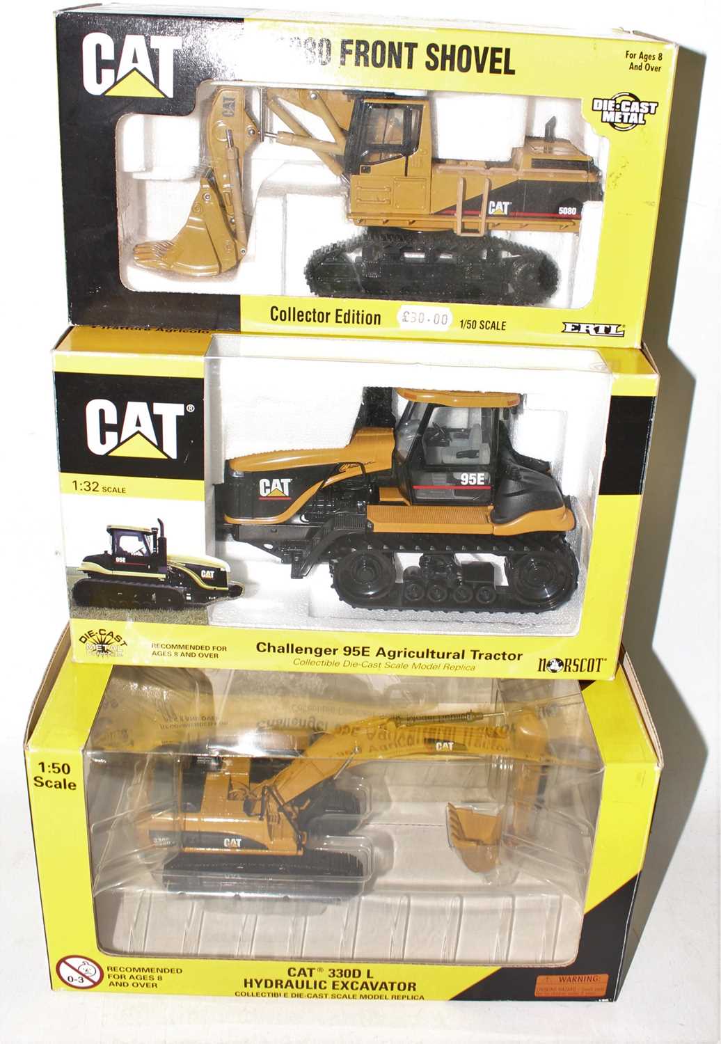 A Norscot and ERTL 1/50 scale Caterpillar diecast group to include an ERTL Caterpillar 5080 front